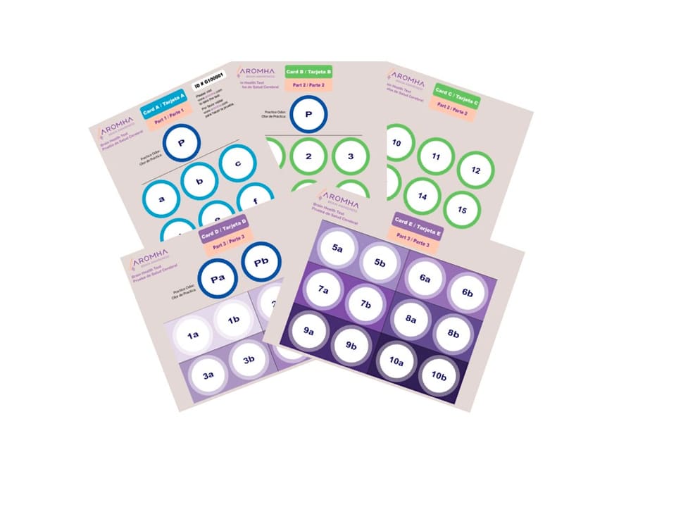A person taking the Aromha Brain Health Test at home using a smell card